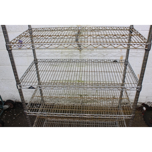 165 - A metal wire racking shelf with 7 shelves, approx 185cm x 90cm wide