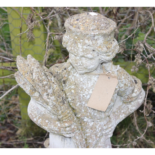 319 - Concrete garden stature of a lady holding wheat, approx 76cm tall