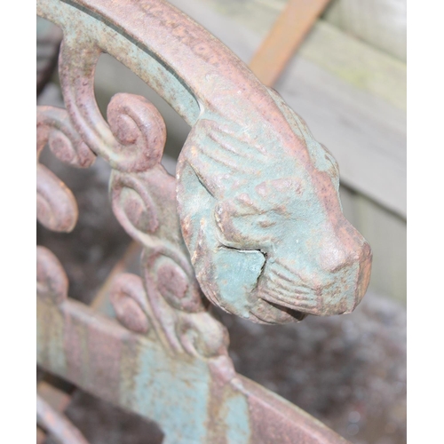 374 - A pair of cast iron bench ends