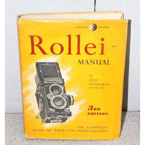 717 - A vintage Rolleiflex TLR camera in original leather case with a number of extras to inc a Rolleipark... 