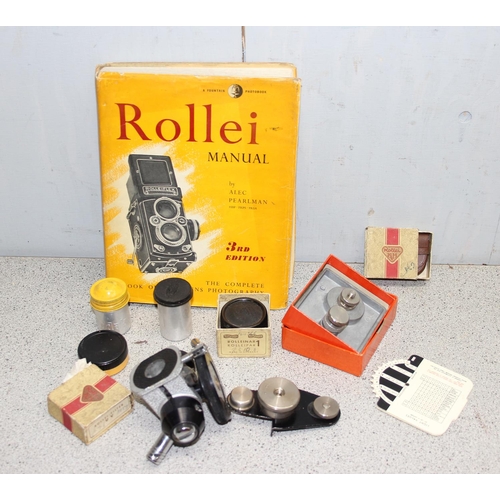 717 - A vintage Rolleiflex TLR camera in original leather case with a number of extras to inc a Rolleipark... 