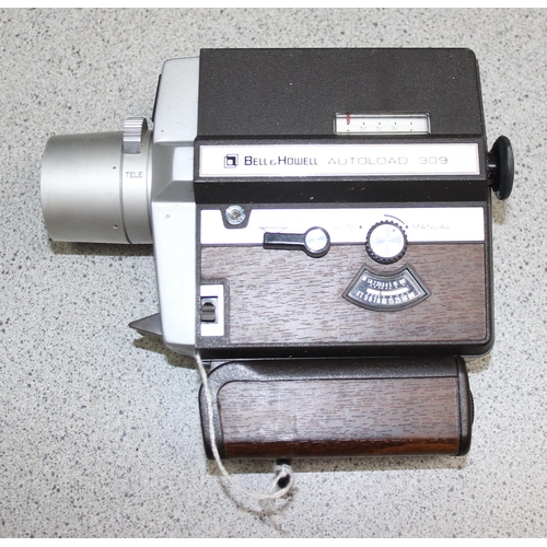 718 - A vintage Voightlander Vitessa T camera in original leather case, 2 lenses to inc a Skoparet 1:3.4/3... 