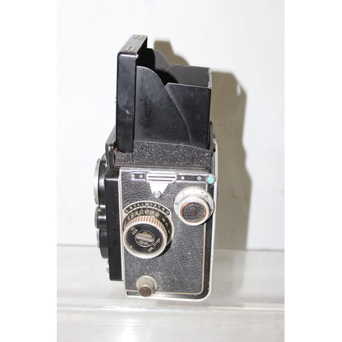 717 - A vintage Rolleiflex TLR camera in original leather case with a number of extras to inc a Rolleipark... 