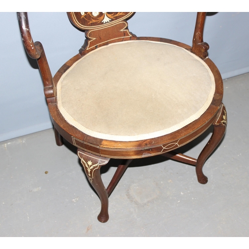 10 - An Edwardian inlaid Mahogany armchair, inlaid with various woods and faux ivory in the classical tas... 