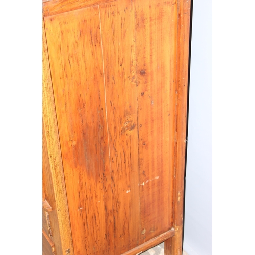 18 - A large Chinese hardwood cabinet, likely Elm with hand wrought iron fittings, likely 19th century, a... 