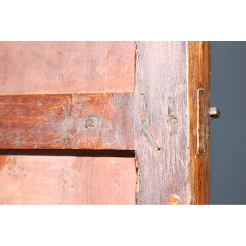 18 - A large Chinese hardwood cabinet, likely Elm with hand wrought iron fittings, likely 19th century, a... 