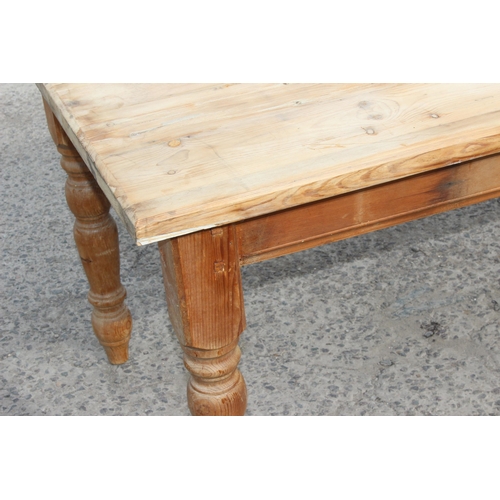 20 - A large vintage pine farmhouse kitchen table with scrub top, approx 185cm x 90cm