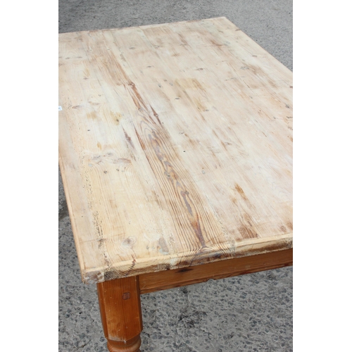 20 - A large vintage pine farmhouse kitchen table with scrub top, approx 185cm x 90cm