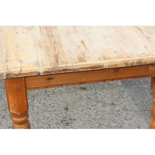 20 - A large vintage pine farmhouse kitchen table with scrub top, approx 185cm x 90cm