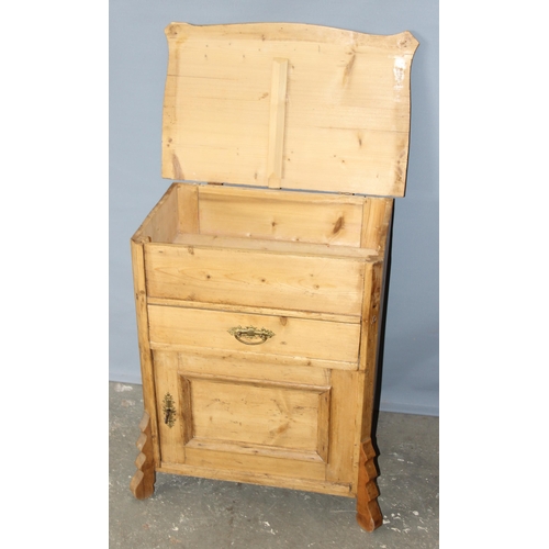 22 - A small antique Pine cupboard or desk, possibly a clerk's desk with lifting top, small drawer and cu... 