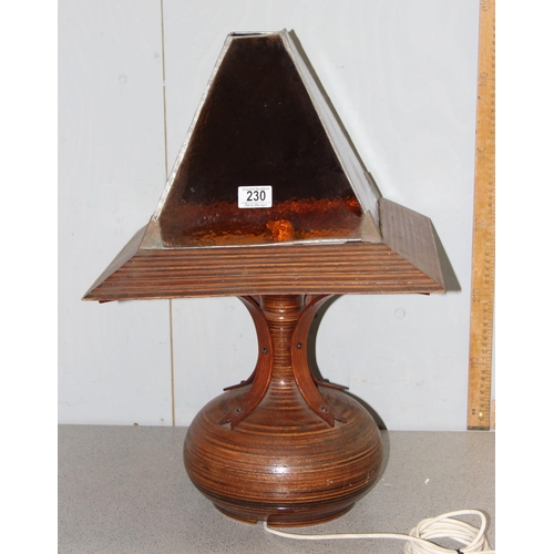 230 - An unusual mid-century turned and laminated wooden table lamp with wooden and stained glass shade, e... 