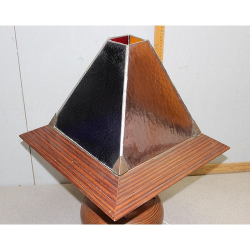 230 - An unusual mid-century turned and laminated wooden table lamp with wooden and stained glass shade, e... 