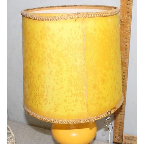 233 - A retro yellow pottery table lamp with matching shade