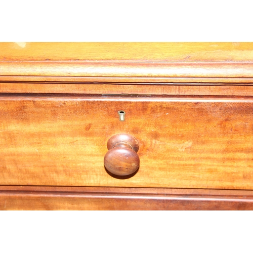 25 - A 19th century 2 over 3 mahogany chest of drawers with turned wooden feet and handles, approx 108cm ... 