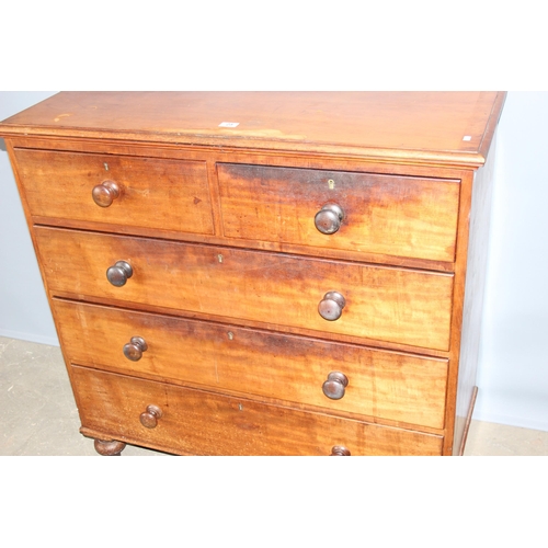 25 - A 19th century 2 over 3 mahogany chest of drawers with turned wooden feet and handles, approx 108cm ... 