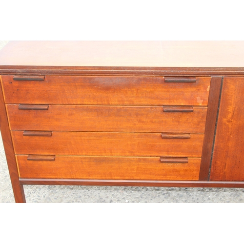 35 - A retro sideboard with 2 cupboards and 3 drawers, likely Scandinavian but seemingly unmarked, approx... 