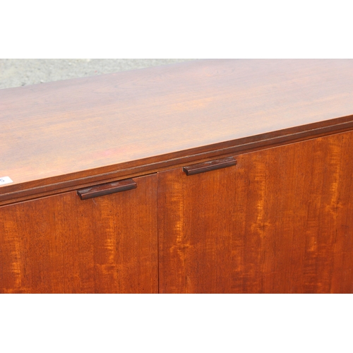 35 - A retro sideboard with 2 cupboards and 3 drawers, likely Scandinavian but seemingly unmarked, approx... 