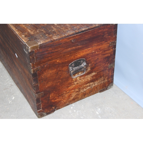 45 - A 19th century camphorwood campaign trunk with metal corners, approx 90cm wide