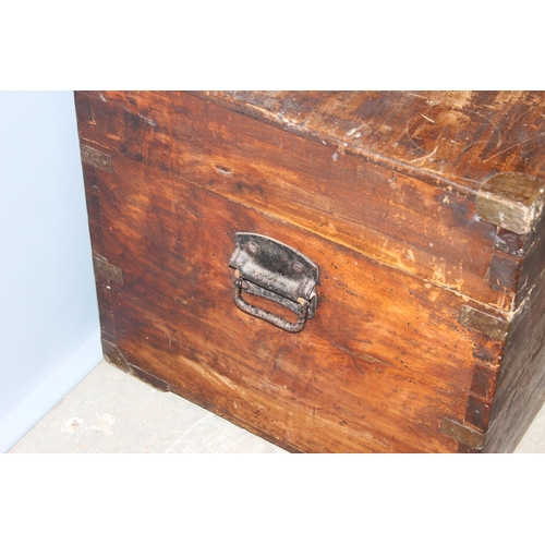 45 - A 19th century camphorwood campaign trunk with metal corners, approx 90cm wide