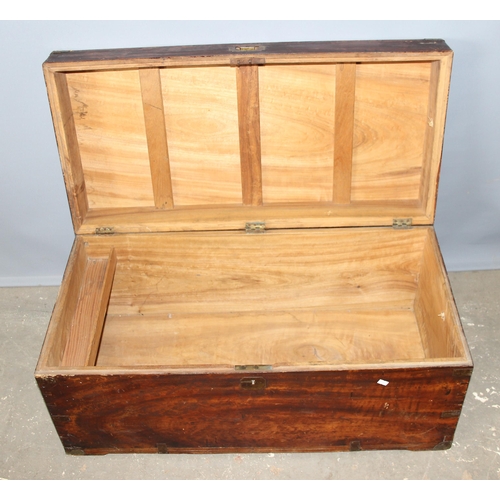 45 - A 19th century camphorwood campaign trunk with metal corners, approx 90cm wide