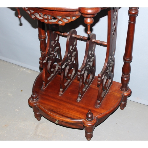 8 - An unusual antique style hall table with fretwork details and magazine rack and drawer to base, appr... 