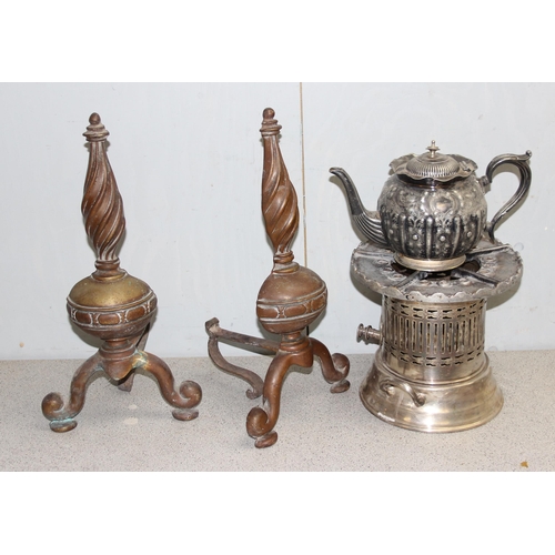 1020 - Collection of mixed metalware to include a pair of brass firedogs, a silver plated teapot and a flam... 