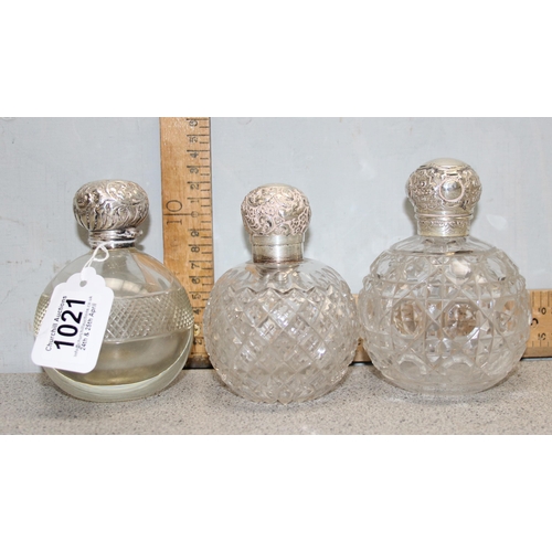 1021 - 3 silver topped grenade shaped perfume bottles, Birmingham 1894 & 1902 & London 1897, each with glas... 