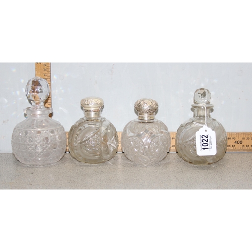 1022 - 4 antique grenade shaped perfume bottles, 2 with silver tops, Birmingham 1904 & Chester 1897, 2 with... 