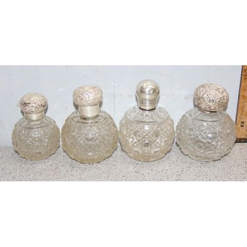 1023 - 7 assorted smaller grenade shaped perfume bottles, 6 with silver tops, various dates and makers, mai... 