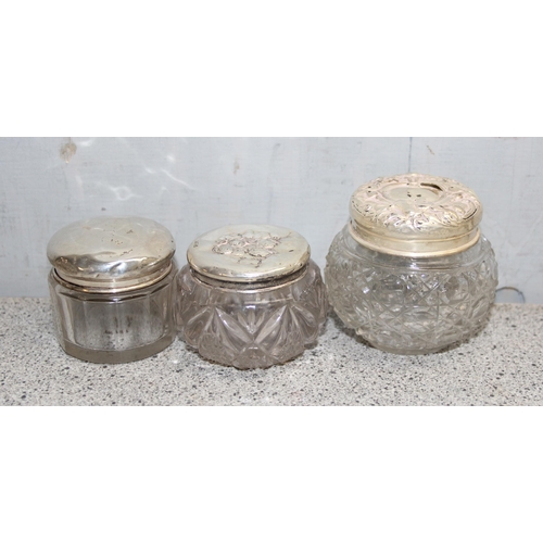 1025 - 7 assorted silver topped and cut glass jars, mainly late 19th and early 20th century, various design... 