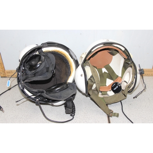 1402 - 2 Gentex pilots helmets and headphones PA 18407 FSCM 97427 and a pair of Astrocom vintage headphones