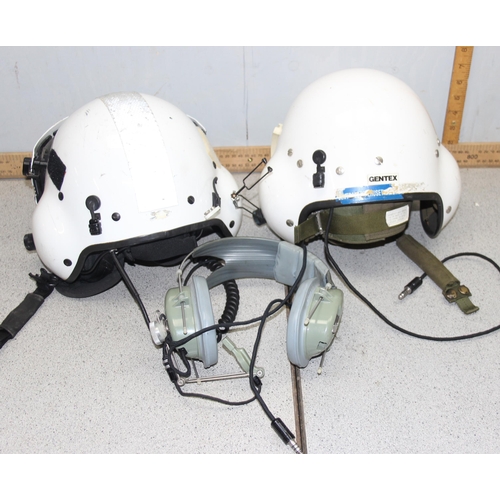 1402 - 2 Gentex pilots helmets and headphones PA 18407 FSCM 97427 and a pair of Astrocom vintage headphones