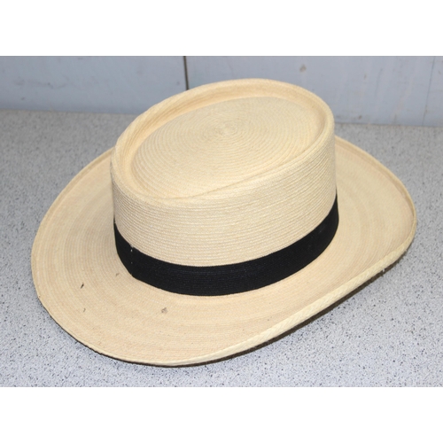 203 - An antique silk top hat, small size and a Guatemalan hat (2)