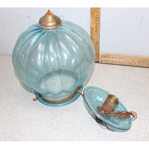 235 - A North African style hanging blue glass pendant light and a small gilt metal and crystal hanging ch... 