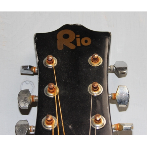 654 - Black Rio acoustic guitar with spare strings