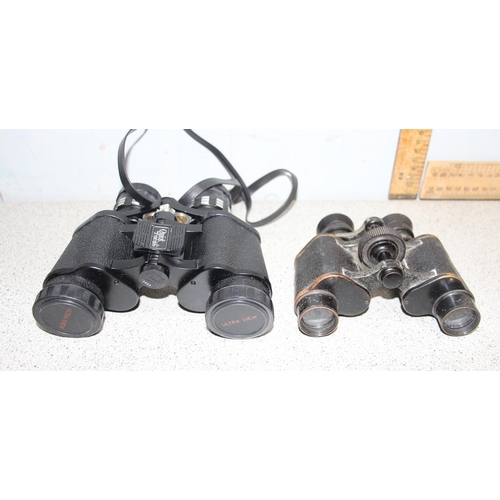 700 - 2 pairs of binoculars in cases, Ultraview and Lemaire of Paris in leather case