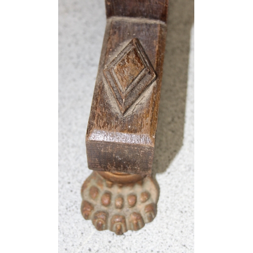 93 - Large early 20th century dinner gong & mallet mounted in oak barley twist frame with lion paw feet