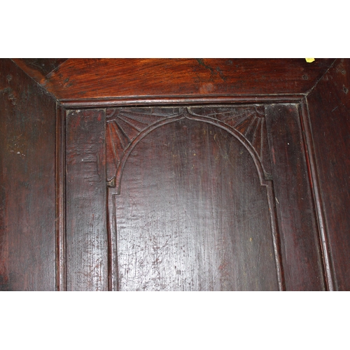 117 - An extremely large long low table formed from an antique wooden door, approx 192cm x 70cm