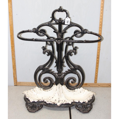 119 - A 19th century cast iron stick stand with drip tray, both pieces with various marks to inc the Victo... 