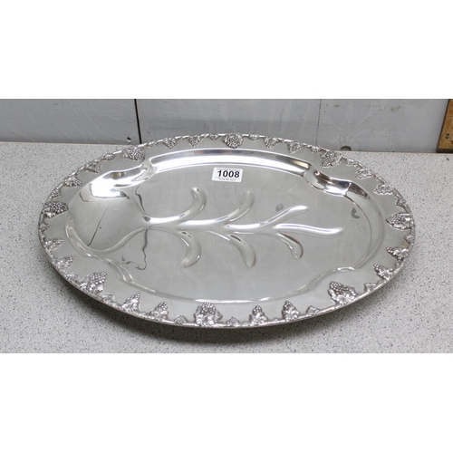 1038 - A large vintage silver plated meat serving dish with grape and vine border, English Silver Co, silve... 