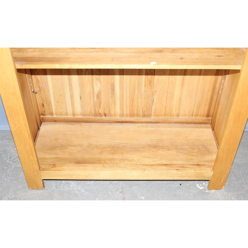 121 - Modern light oak book shelf, approx 190cm high x 100cm wide