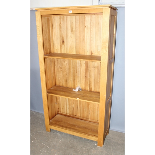 121 - Modern light oak book shelf, approx 190cm high x 100cm wide