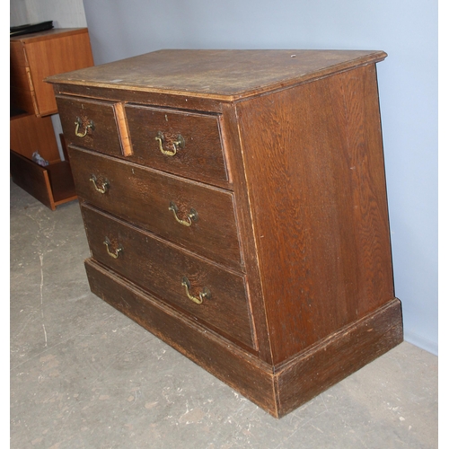 123 - Antique oak 2 over 2 chest of drawers with brass swan neck drop handles, approx 107cm wide