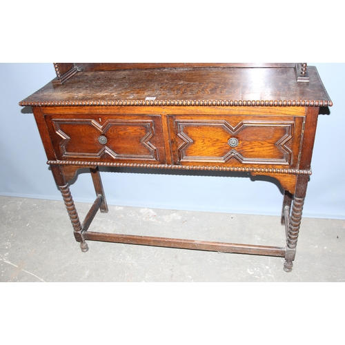 124 - Jacobean style oak dresser on bobbin turned supports, approx 193cm tall x 100cm wide