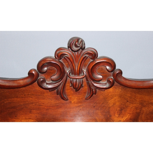 128 - A 19th century mahogany hall cupboard with well carved Fleur-de-Lys finial, single drawer over 2 cup... 