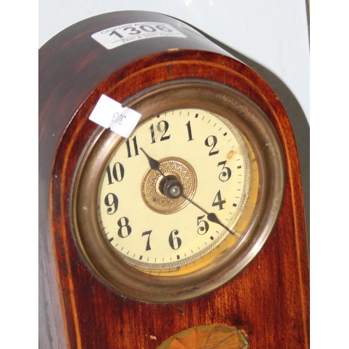 1306 - An early 20th century Sheraton revival inlaid mahogany mantle clock with mechanical movement