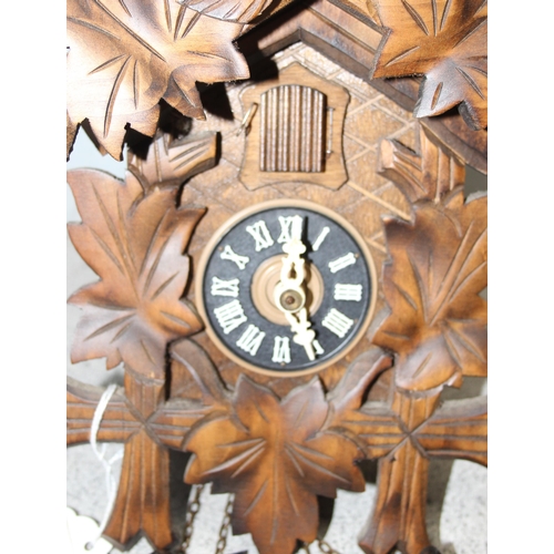 1308 - Vintage Swiss cuckoo clock with fur cone weights