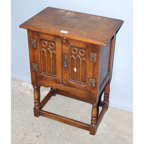 134 - Early 20th century carved oak pot cupboard, approx 50cm wide