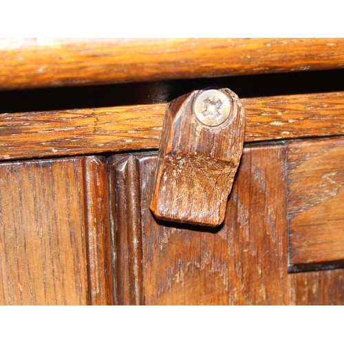 134 - Early 20th century carved oak pot cupboard, approx 50cm wide