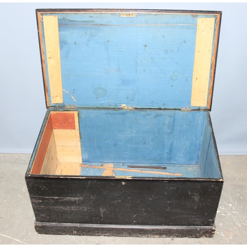 135 - Antique painted pitch pine storage trunk with drop handles. approx width 94cm